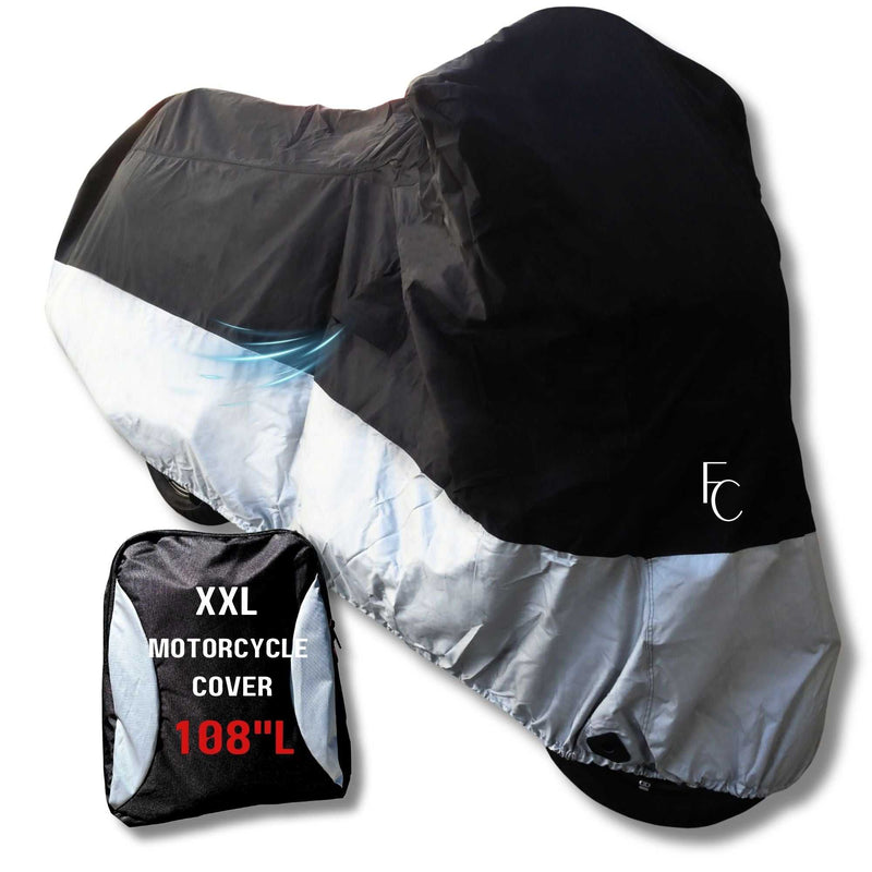 A large black and gray motorcycle cover, crafted from Water Repellent WeatherWarrior fabric, is draped over the motorcycle. To the left, there is a carrying bag with the text "Formosa Covers Heavy Duty Motorcycle Cover with Cable & Lock (XXL) 108''L" printed in white and red letters.