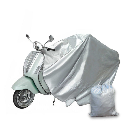 A white scooter partially covered by the Formosa Covers Deluxe Scooter, Moped, or Vespa Cover - Medium in weather-resistant, silver 150 Denier Polyester. A matching drawstring storage bag rests on the ground next to the scooter.