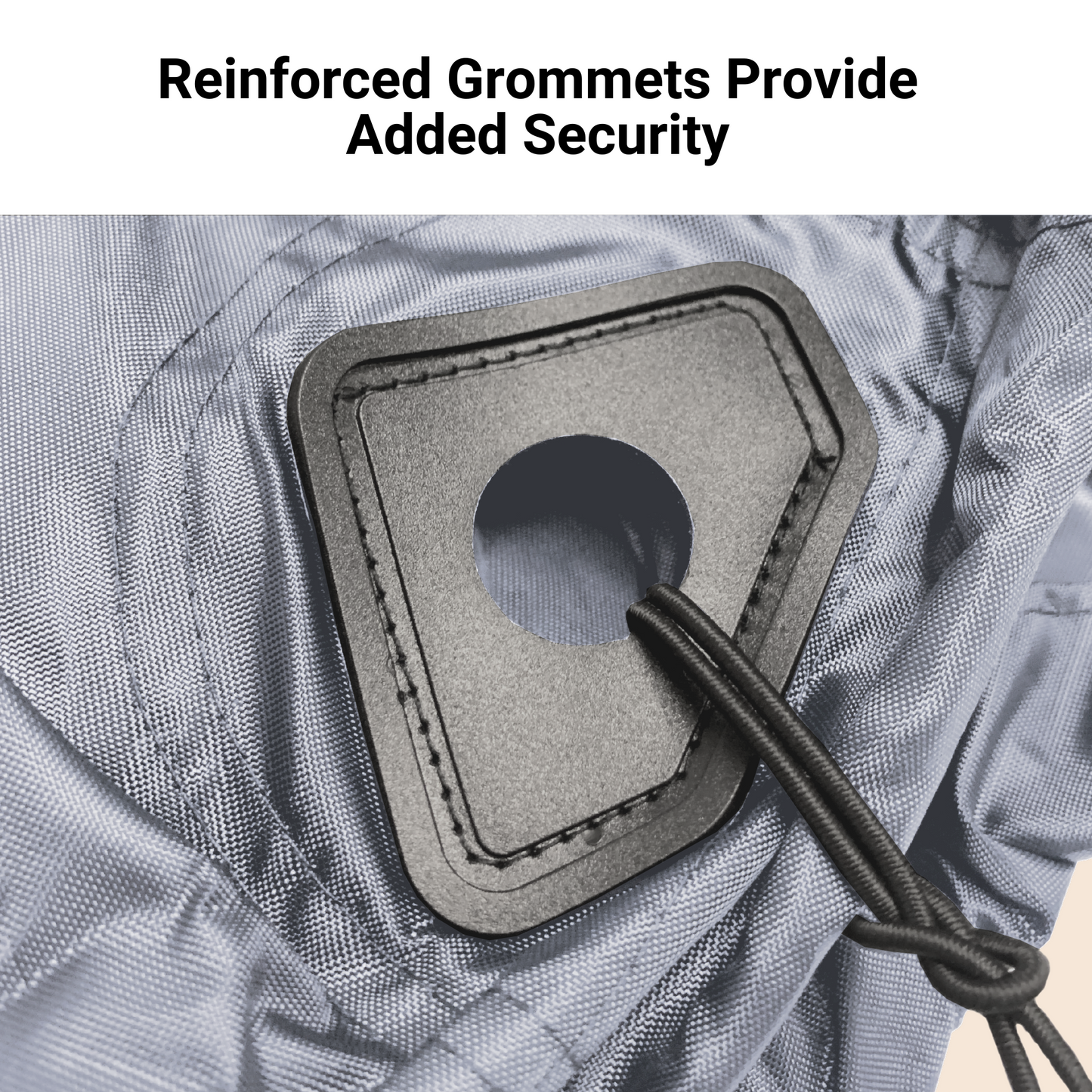 Close-up of a reinforced grommet on a gray fabric. The grommet is secured with a black cord passing through it, illustrating the sturdiness designed for added security. The text at the top reads, "Reinforced Grommets Provide Added Security." Suitable for heavy-duty UTV cover needs. Introducing the **Formosa Covers UTV Cover - Large 120" L x 62" W x 75" H**