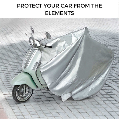 A Deluxe Scooter, Moped, or Vespa covered with a weather-resistant, protective silver cover is parked on a tiled surface. The text above the image reads, "Protect your scooter from the elements with Formosa Covers.