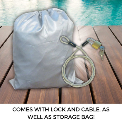 The weather-resistant Deluxe Scooter, Moped, or Vespa Cover - Medium from Formosa Covers is placed on a wooden surface near a pool. Next to this grey cover are a cable lock, a carabiner, and a key. Text at the bottom reads, "COMES WITH LOCK AND CABLE, AS WELL AS STORAGE BAG!