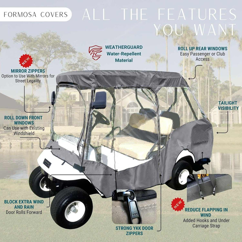 The Formosa Covers 2+2 Passenger Golf Cart Driving Enclosure Cover in grey includes a weather-resistant cover with YKK door zippers, roll-up windows, and mirror zippers. Designed for functionality in all weather conditions, it ensures tail light visibility while being surrounded by the serene setting of trees and water.