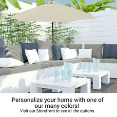 Outdoor patio seating area with the **Formosa Covers 9ft Market Patio Umbrella 8 Rib Replacement Canopy in Natural**. Features striped and solid cushions in shades of white, grey, and black atop built-in benches with a white wooden table. Decorative bamboo plants in the background. Personalize your home with one of our many colors of durable polyester fabric!