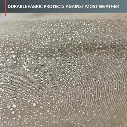 Close-up image of water droplets on beige fabric with a textured pattern, showcasing its premium water-resistant properties. A banner at the top reads, "Durable fabric protects against most weather," making the Formosa Covers BBQ Outdoor Grill Cover 56"L x 25"D x 46"H Taupe ideal for any BBQ cover needing all-weather protection.