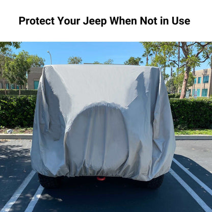 A parked Jeep covered with a Formosa Covers heavy-duty Jeep Cover fit for 1976-2006 models in gray, sits in a parking lot. The background features trees, a green hedge, and modern buildings under a clear sky. The text "Protect Your Jeep When Not in Use" is displayed at the top of the image, ideal for long-term storage.