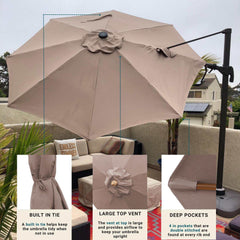 A taupe 10ft Cantilever Supported Bar Umbrella with an 8 rib replacement canopy from Formosa Covers, crafted from durable non-fray 300 denier polyester fabric, is set up on a deck with outdoor furniture. Close-up insets show a built-in tie for tidiness, a large top vent for airflow, and deep pockets for stability. The background features neighboring homes and trees.