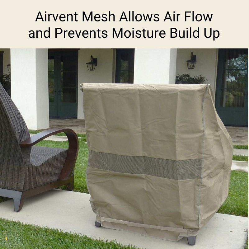 A Classic Taupe Patio Outdoor Club Chair Cover by Formosa Covers, measuring 33.5" L x 36" D x 37" H, is draped over a lawn chair, providing all-season protection with its air vent mesh feature. Nearby, a wicker chair sits in front of a building with large windows. The text reads: "Airvent Mesh Allows Air Flow and Prevents Moisture Build Up.