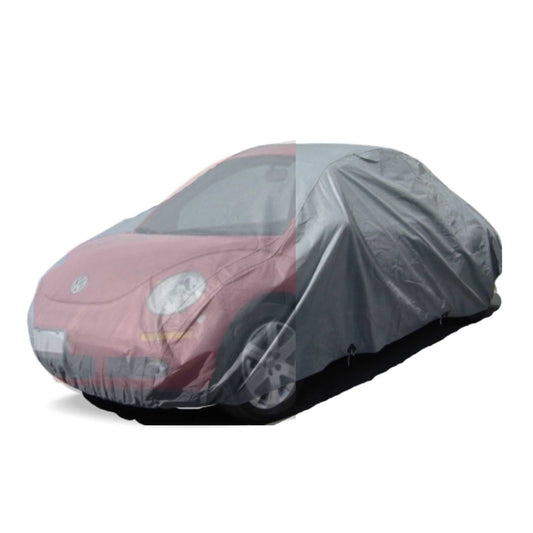 A Volkswagen Beetle with a compact, rounded shape and a red front is shown partially covered by the Formosa Covers Car Cover, specifically designed for small sports cars like this one. The heavy-duty Poly 200 Grey cover drapes over the entire vehicle, leaving the front exposed to reveal the headlights and a portion of the windshield.
