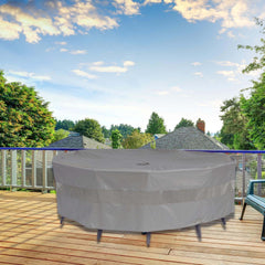 A round outdoor furniture set, protected by the Formosa Covers Patio Conversation Set Cover in Reserve Grey (104