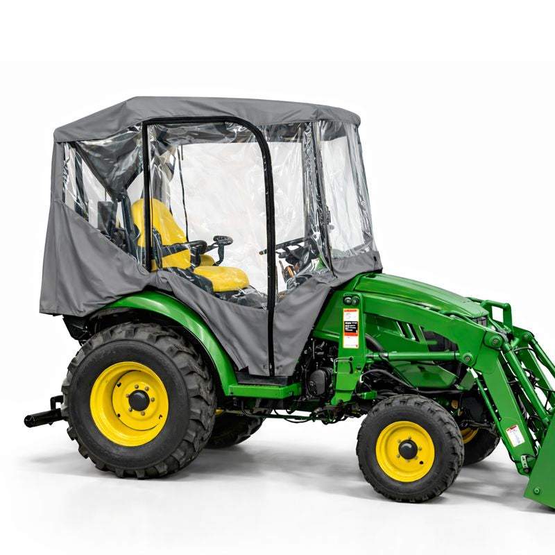 Grey tractor enclosure cab with clear PVC windows for weather protection and tool-free installation