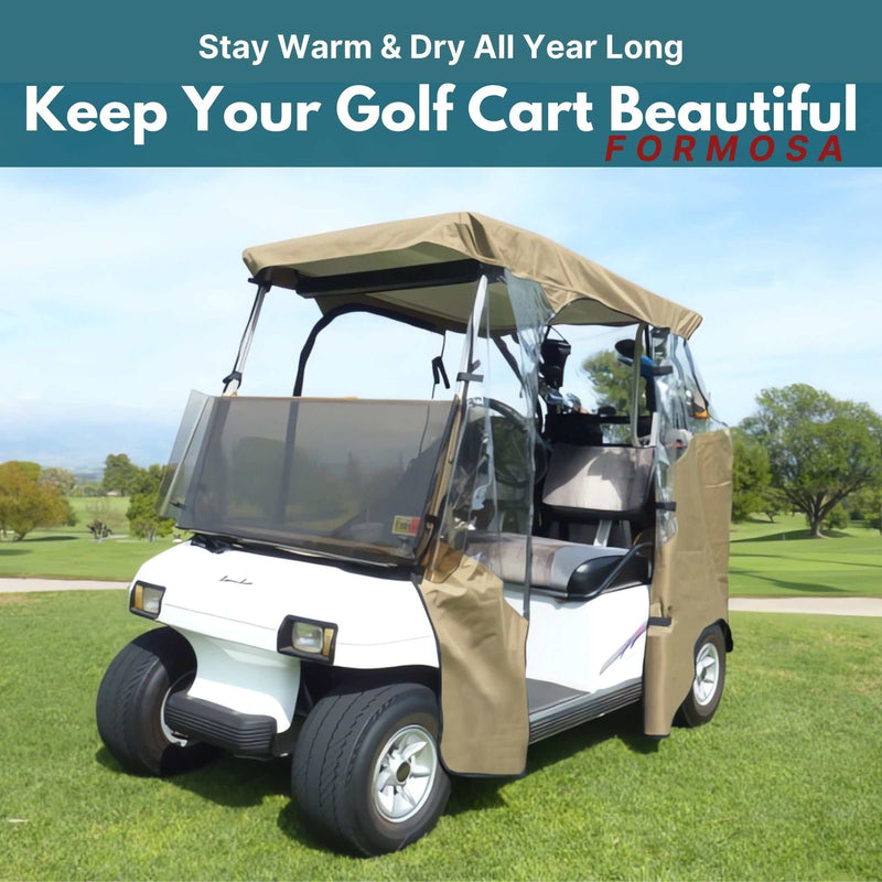 A taupe 2 Passenger 3 Sides Golf Cart Driving Enclosure Cover Open Front from Formosa Covers shields a white golf cart on a golf course. The text above reads, "Stay Warm & Dry All Year Long - Keep Your Golf Cart Beautiful - FORMOSA." The background shows lush green grass and trees.