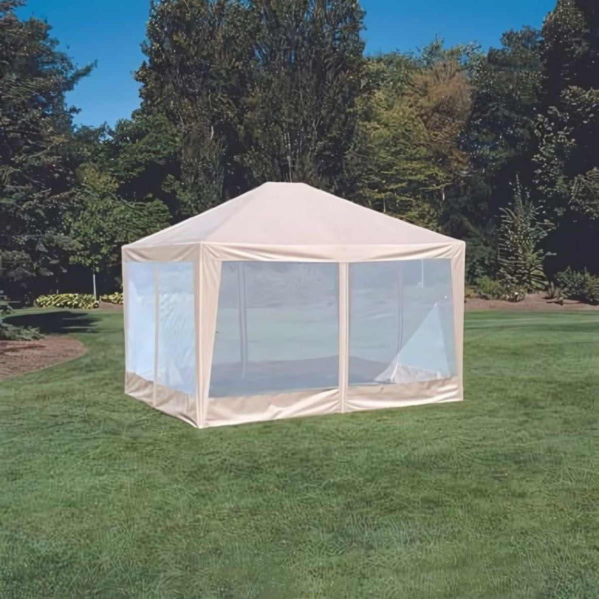A 12ft x 10ft Screen House Replacement Fabric Skin in Beige by Formosa Covers is set up on a lush green lawn, surrounded by trees. The clear blue sky above indicates it is a sunny day.
