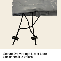 Close-up of the end of a BBQ Outdoor Grill Cover by Formosa Covers with secure black drawstrings featuring two toggles. The focus is on the drawstring assembly, and there is a caption beneath it that reads, 