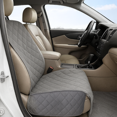 Grey quilted pet single car seat cover with floor coverage in a car interior